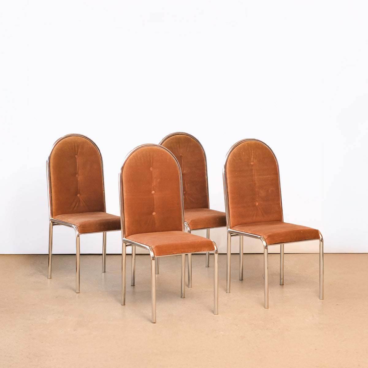 Mid-century modern beige chrome dining chair set on a plain white background — chrome frames and tapered profile