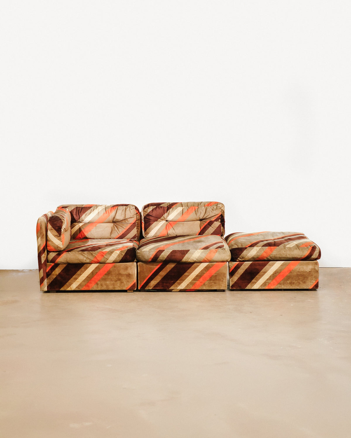 Vintage modular sofa by Luigi Tiengo for Cimon (1974) on a plain white background — sculptural modular seating