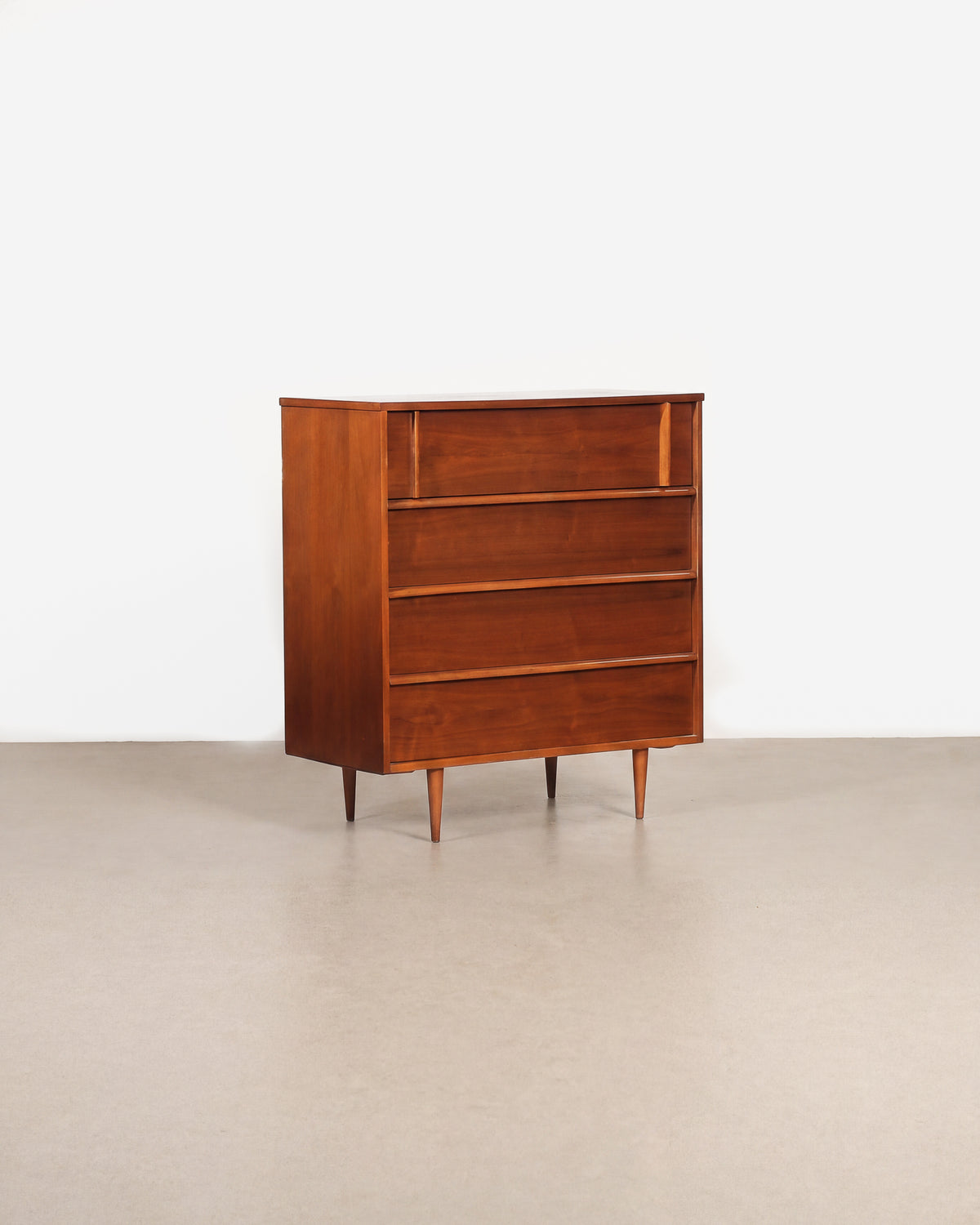 Mid-century modern dark walnut tallboy dresser on a plain white background — restored rich walnut grain