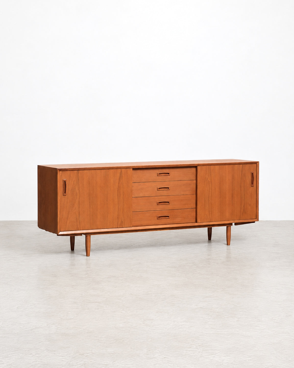 Full side profile of the teak sideboard showing its length and proportions