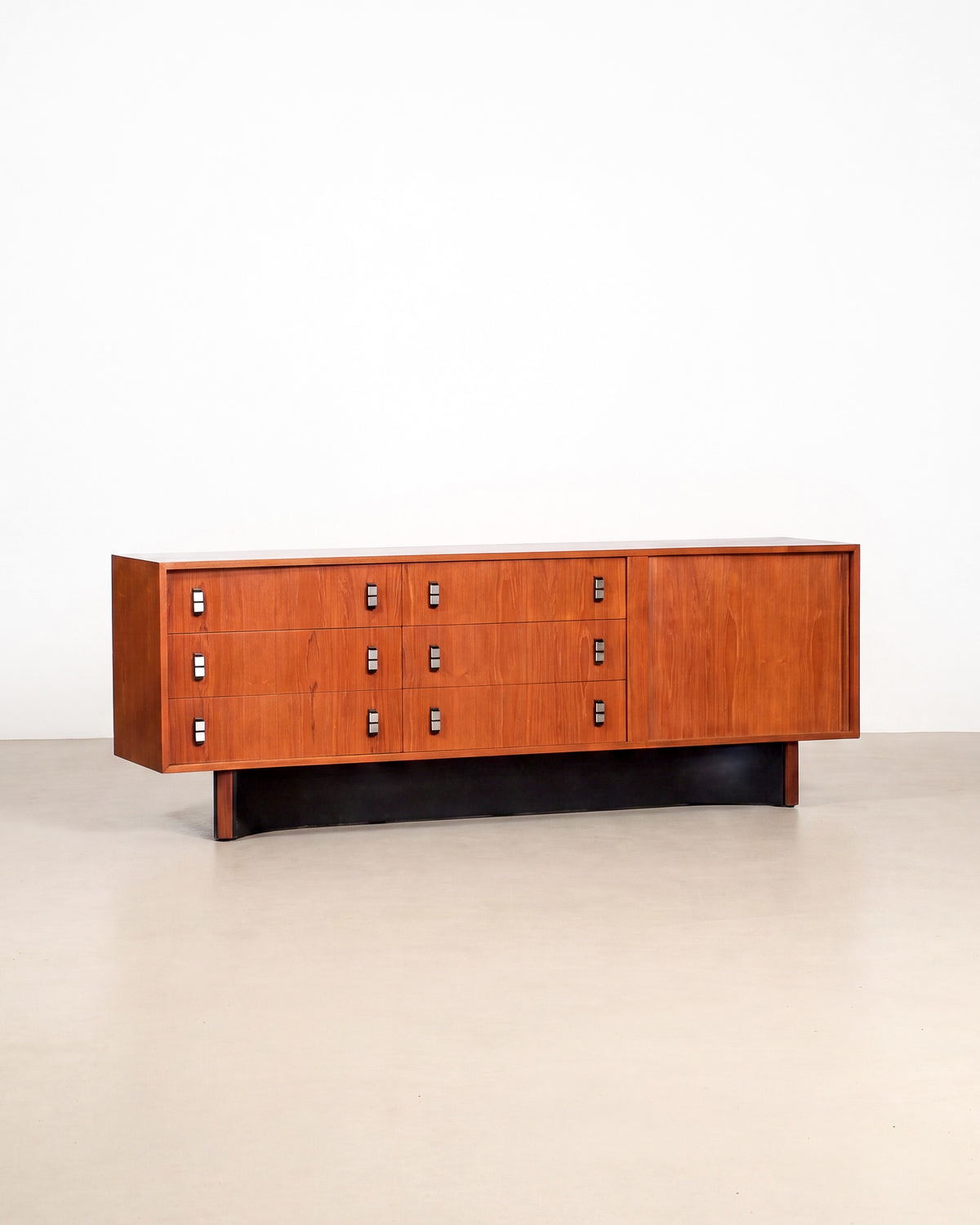 Mid-century modern teak credenza by RS Furniture on a plain white background — tambour doors and rich teak grain