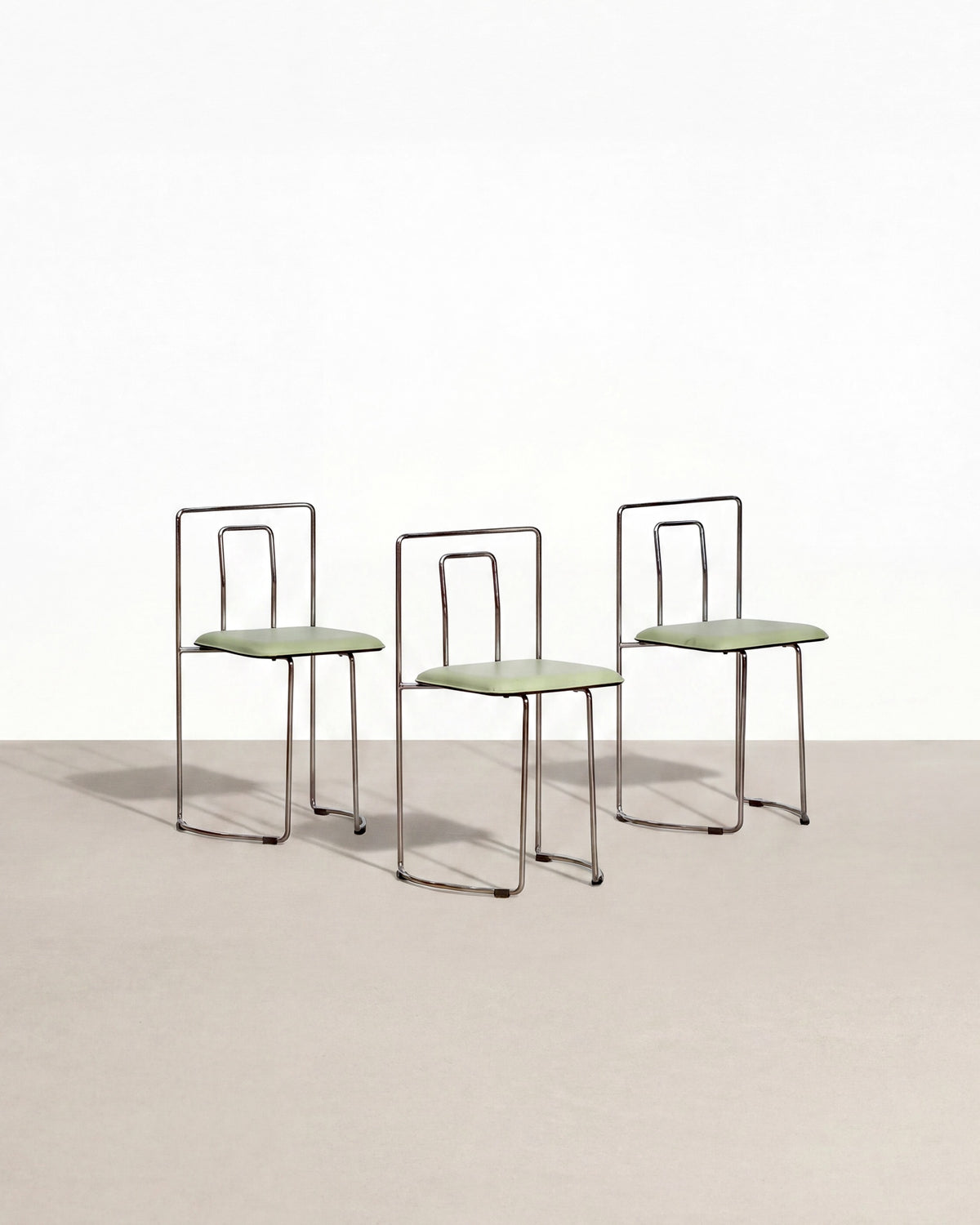 Set of 3 Gaja style chairs on a plain white background — sculptural silhouettes and postmodern design