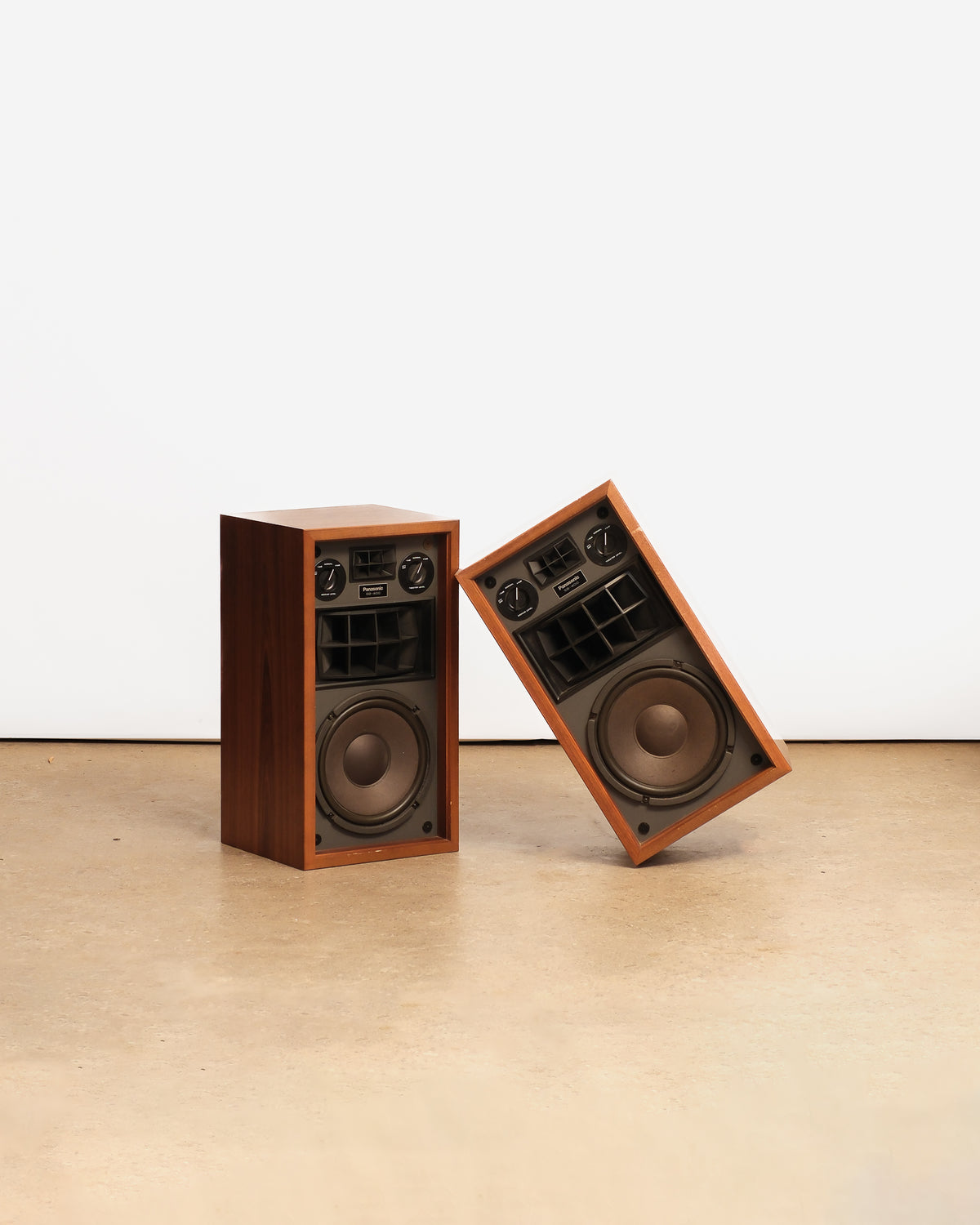 Vintage Panasonic speaker set on a plain white background — classic mid-century audio design