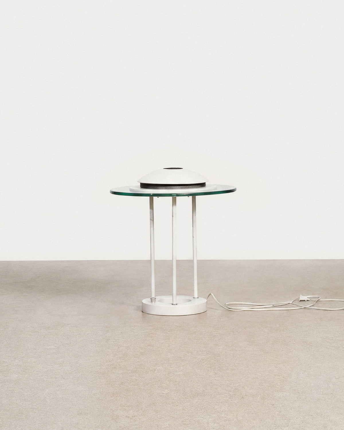 Space Age Saturn lamp in the style of Robert Sonneman on a plain white background — disc-shaped shade