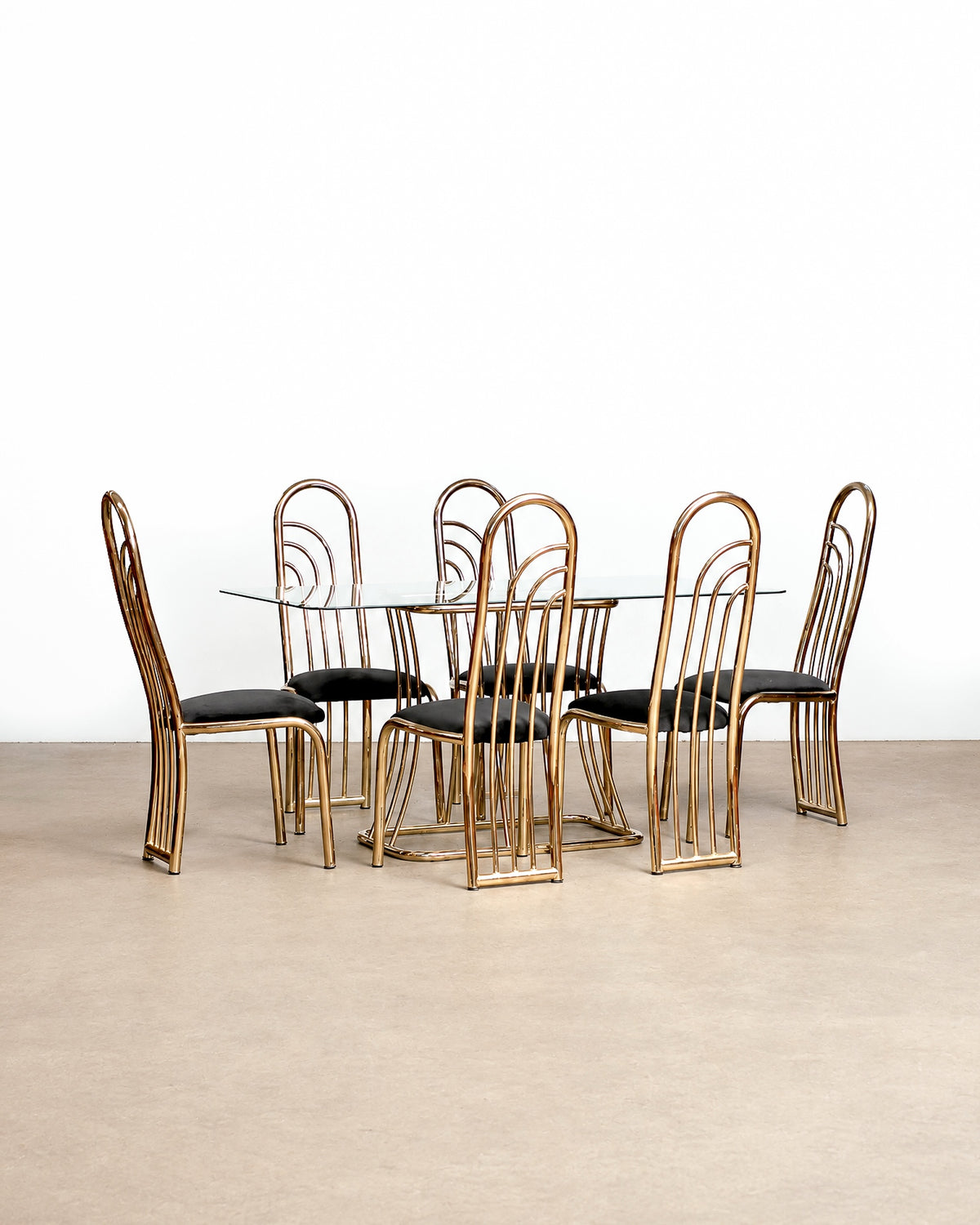 Detail shot of the chair's brass foot and floor glide.