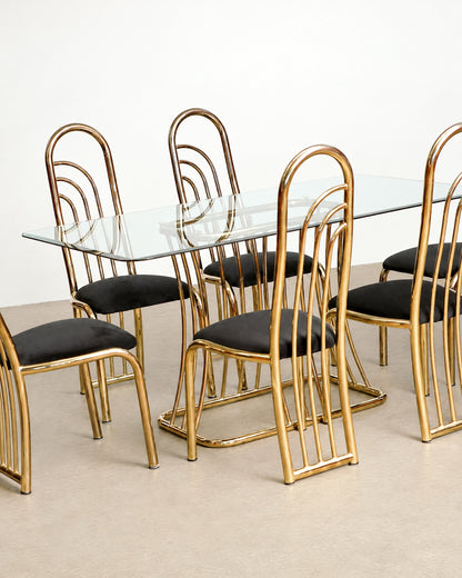 Close-up of the brass tubing texture and patina along the backrest.