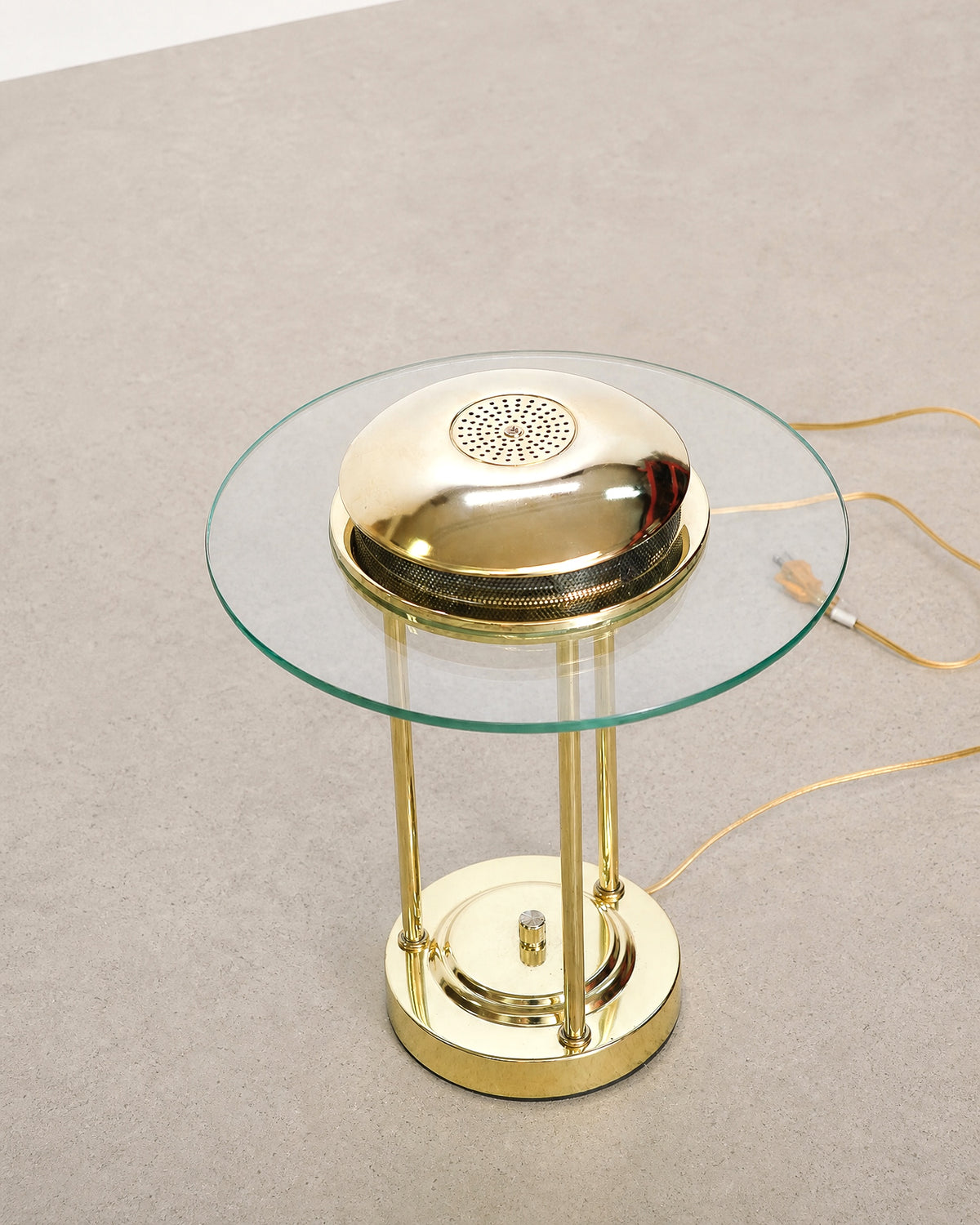 Detail of the brass rod joinery where it meets the domed shade.