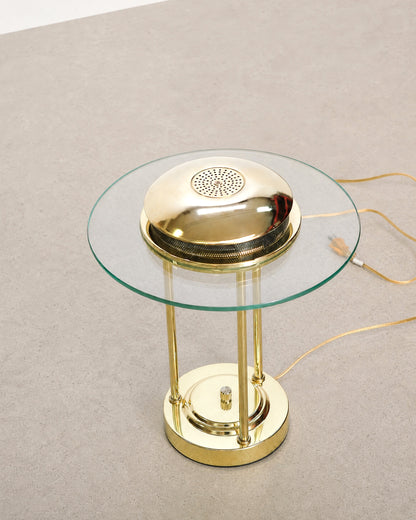 Detail of the brass rod joinery where it meets the domed shade.