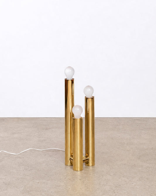 Additional angle of the vintage brass table lamp showing its sculptural form