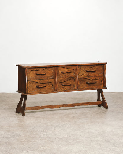 Full side profile of the vintage brutalist oak dresser showing its overall form.