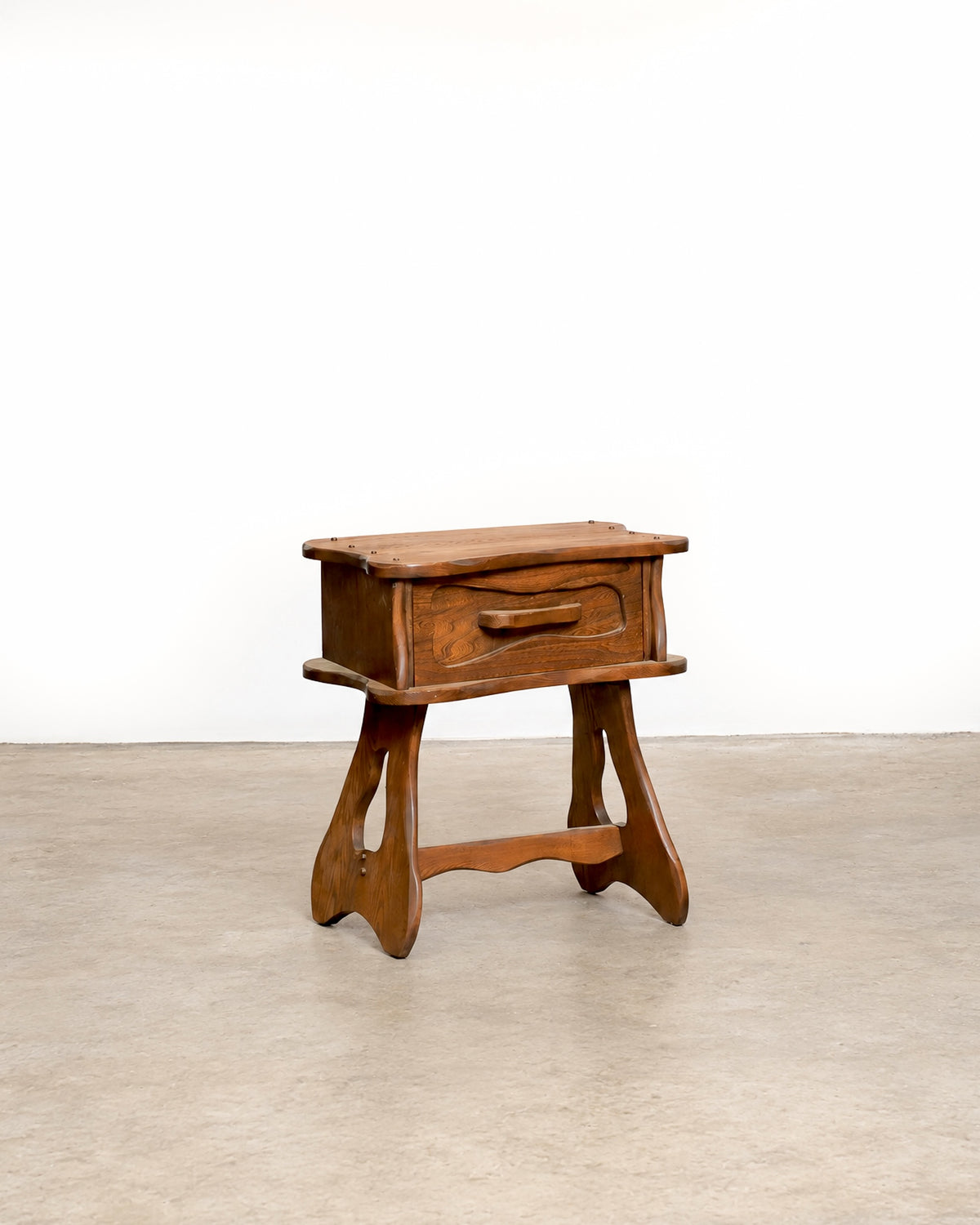 Studio shot of the nightstand against a white background showing full silhouette.