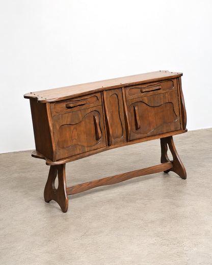 View of the sideboard from a low angle showing the underside stretcher.