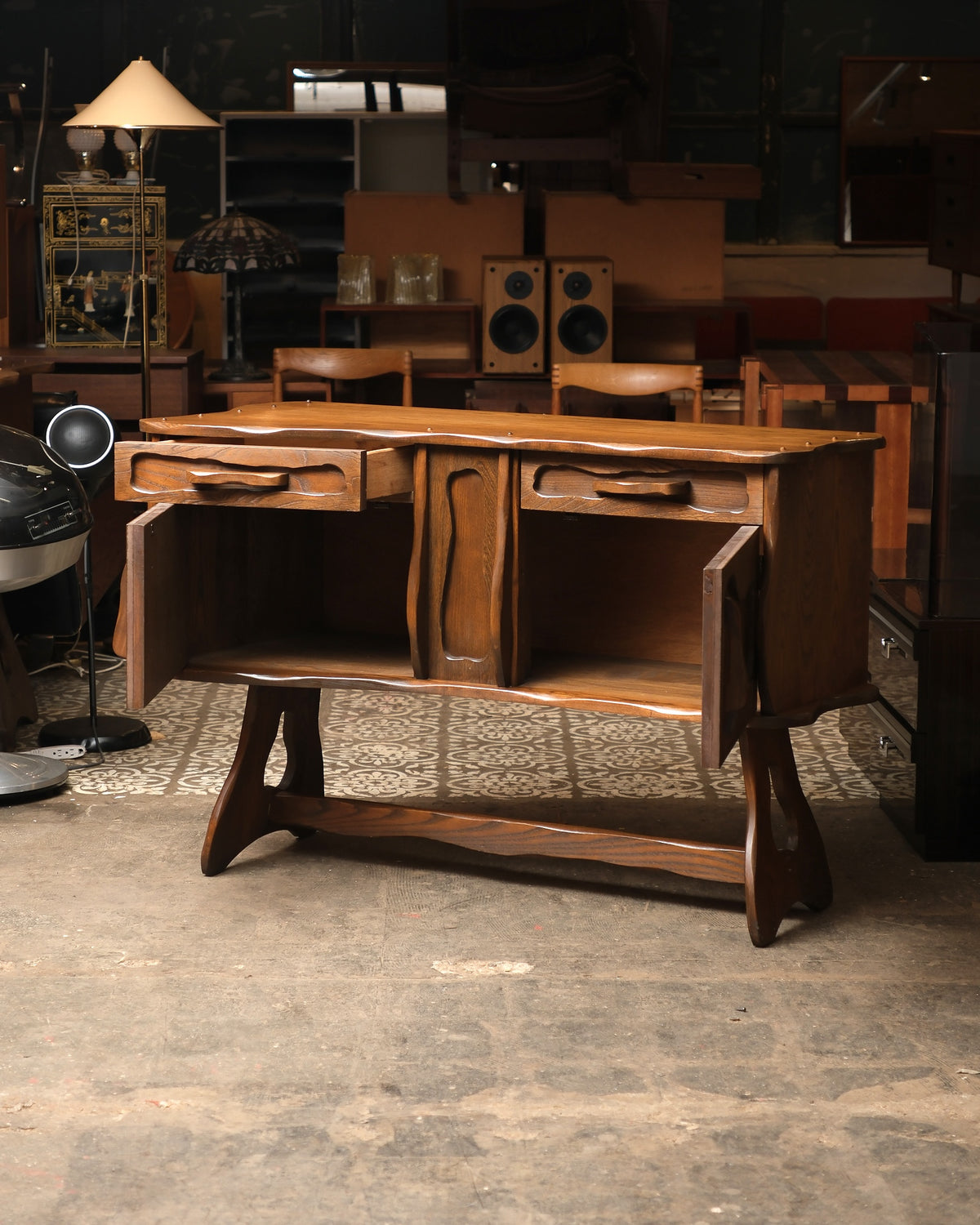 Side profile of the sideboard showing depth and trestle base construction.
