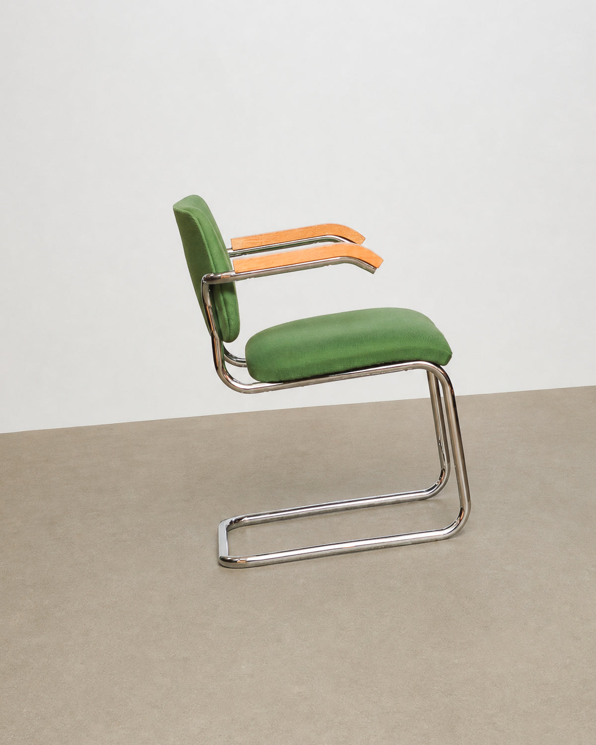 Additional angle of the Cesca-style chair showing the back and armrest detail.
