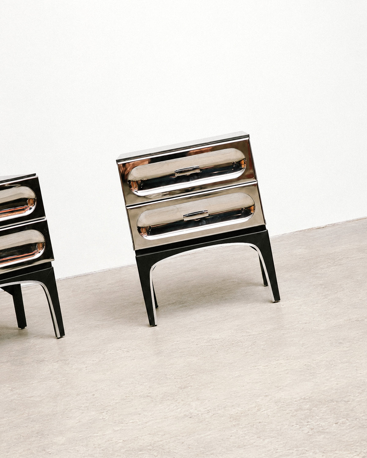 Additional angle showing the chrome and black lacquer finish contrast.