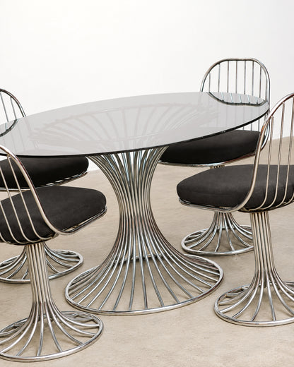 Additional view of the dining set showing the overall chrome and glass design.