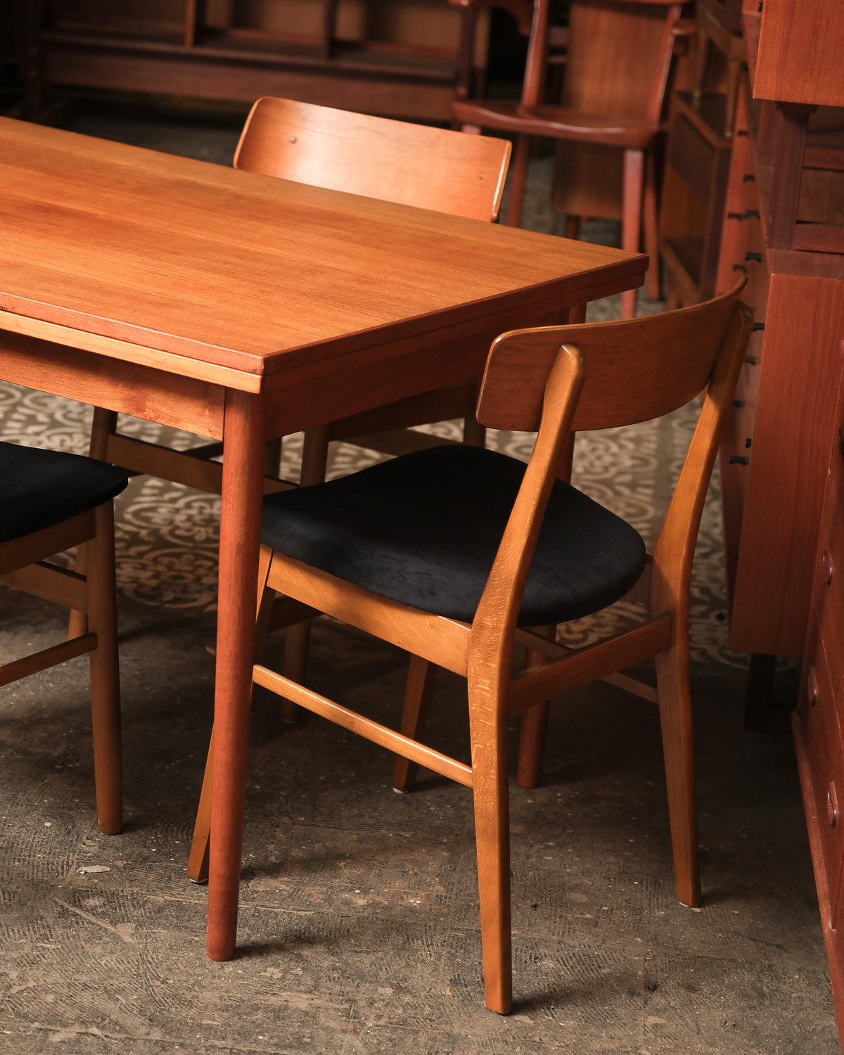 Front view of the dining table showing the wood grain of the top.