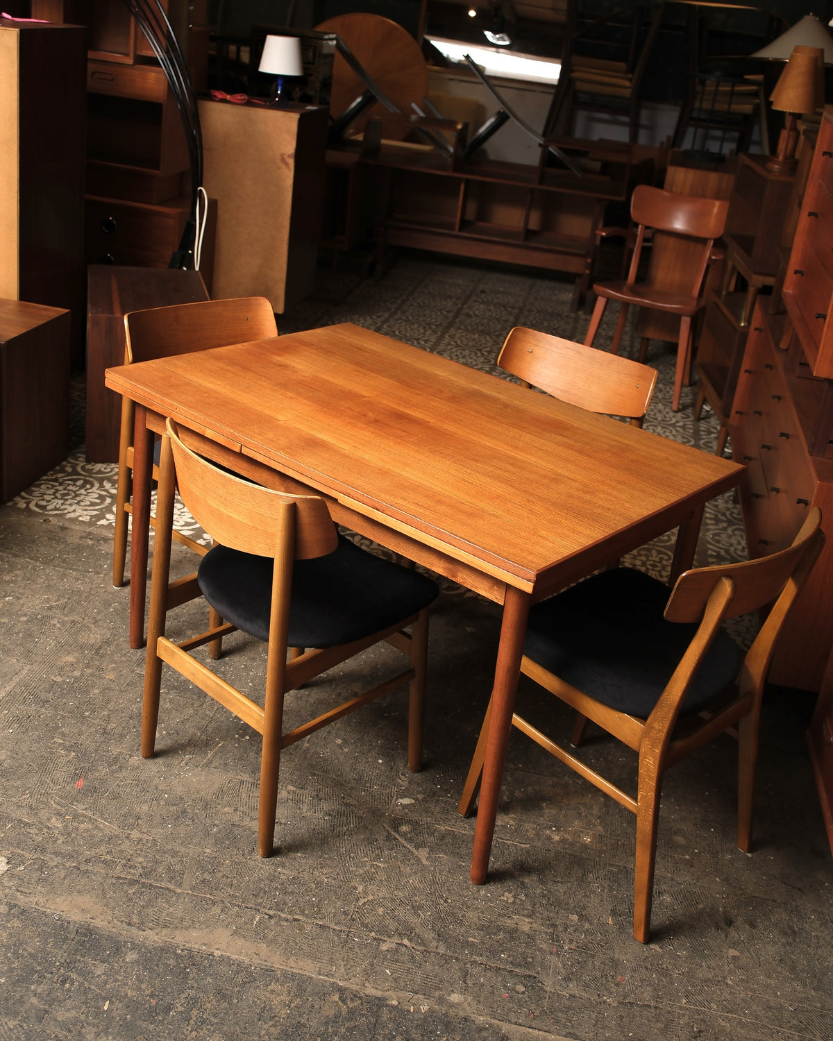 Side view of the table highlighting the tapered leg design.