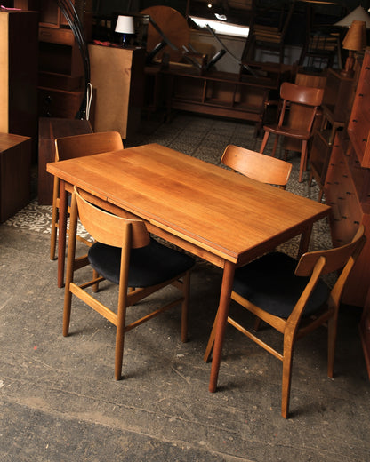 Side view of the table highlighting the tapered leg design.