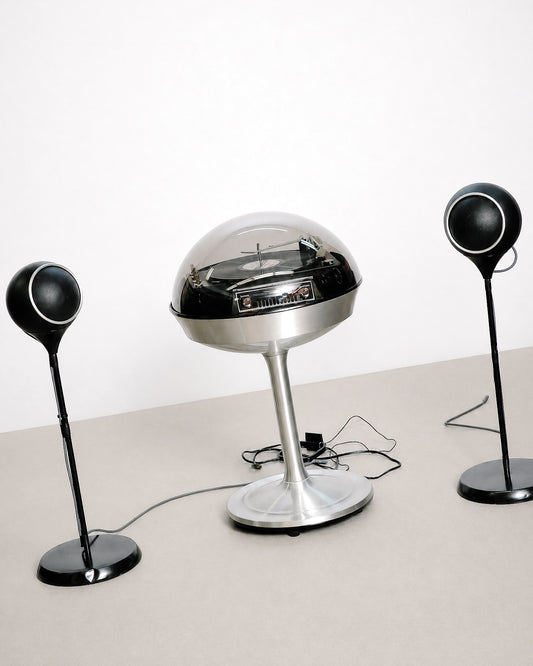 Full profile of the Electrohome 711 Saturn showing its overall dome, base, and proportions.