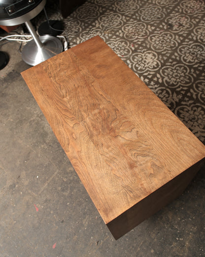 Overhead view of the dresser top showing rich birdseye wood grain detail.