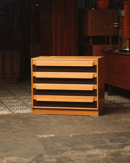 Close-up detail of a drawer pull and drawer construction