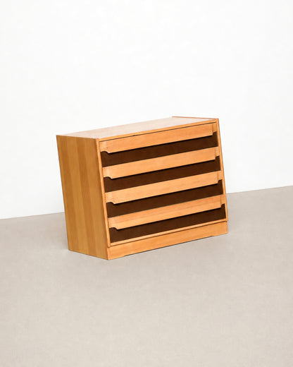 View of the dresser case side panel and wood grain