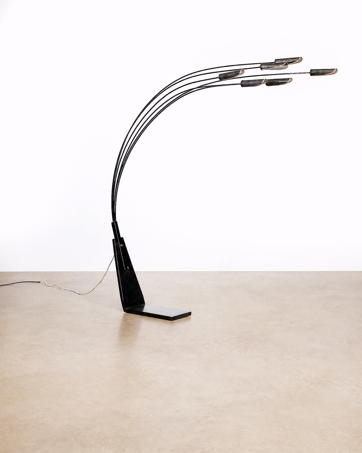 Full front view of the floor lamp displaying all six arms and shades with cord visible.