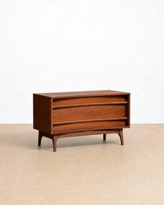 Wooden dresser on a beige floor with a white background