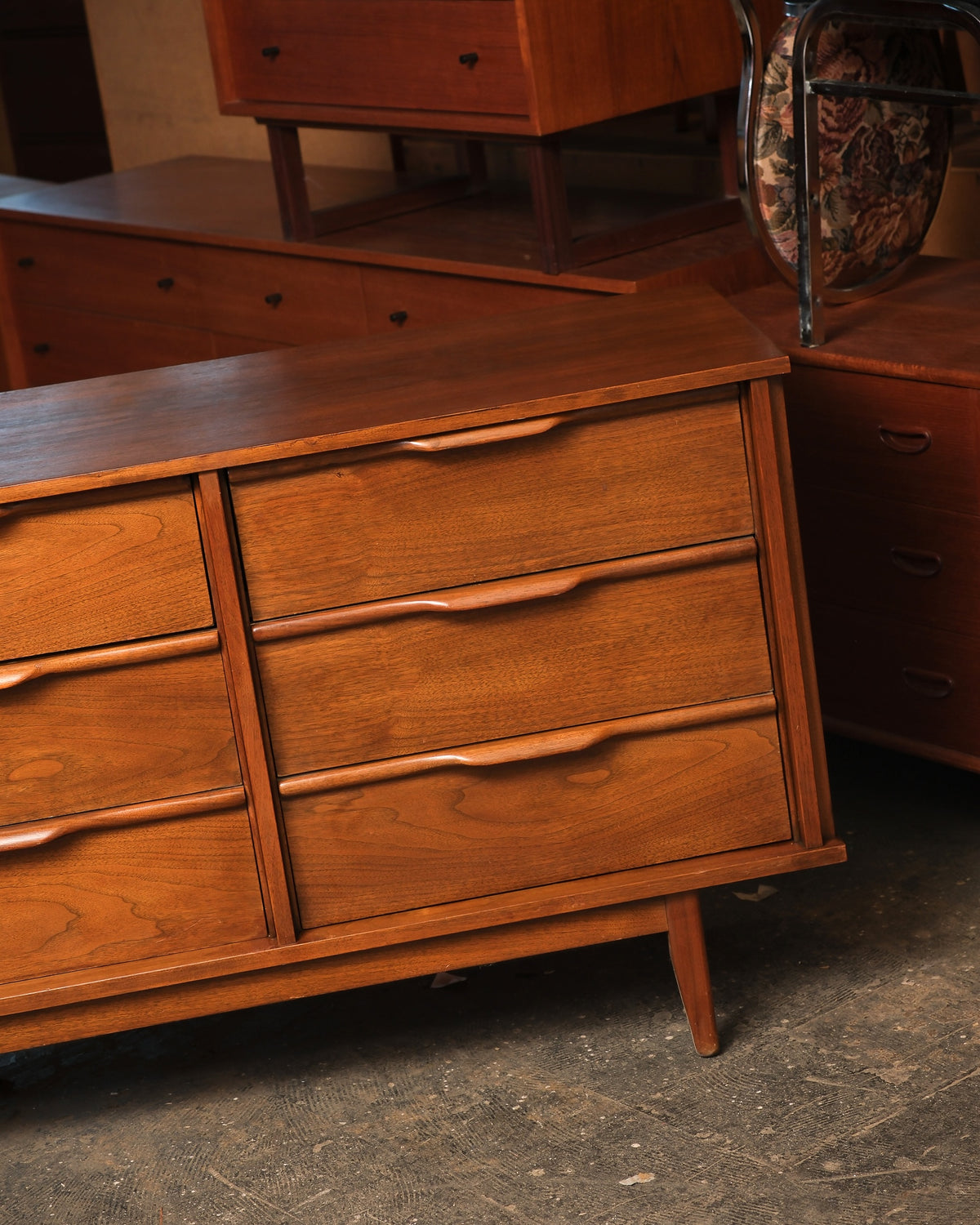 Close-up of drawer pulls and top edge detail from an angled view