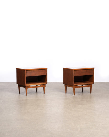 Full view of a single dark walnut nightstand from a slight side angle.