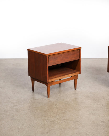 Additional angle of the nightstand showing the open lower shelf and leg detail.