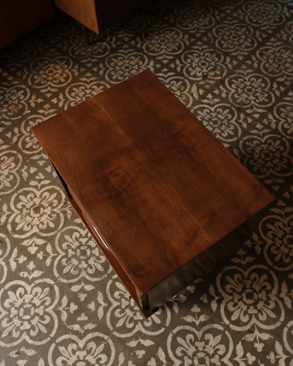 Overhead view of the nightstand top showing natural walnut grain pattern.