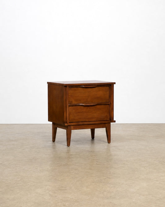 Side view of the nightstand showing tapered leg and drawer alignment.