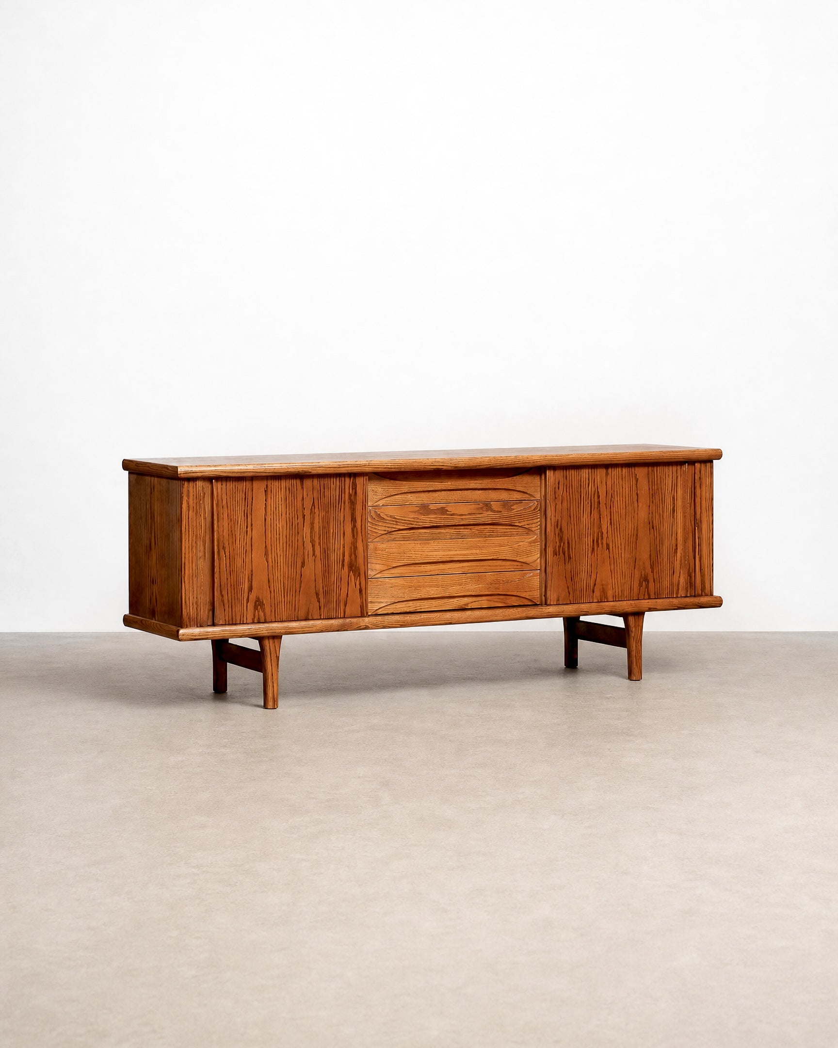 Wooden sideboard with drawers on a plain background
