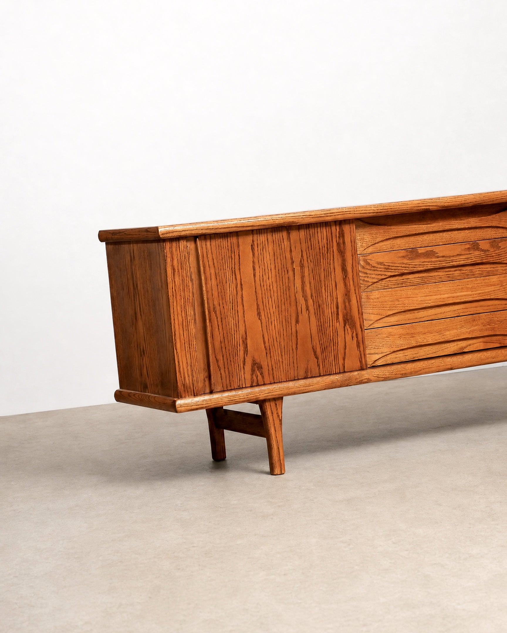 Wooden sideboard with a minimalist design on a plain background