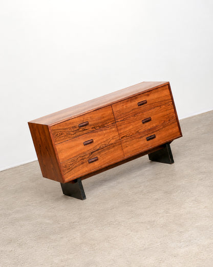 Three-quarter view of the rosewood dresser against a plain background, showing overall proportions.