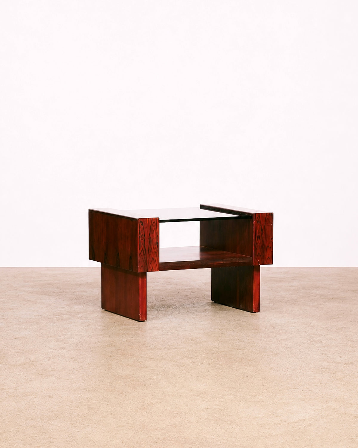 Front view of the rosewood coffee table against a plain background, showing its full form.