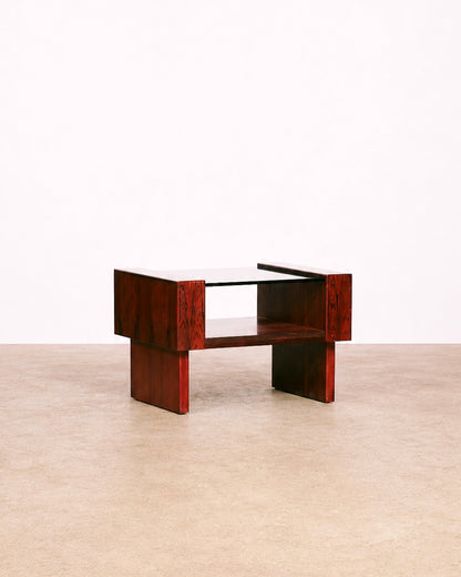 Front view of the rosewood coffee table against a plain background, showing its full form.