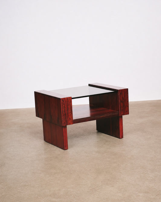Close-up detail of the table's leg and lower shelf construction.