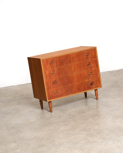 Additional detail view of the teak dresser showing case construction and finish.