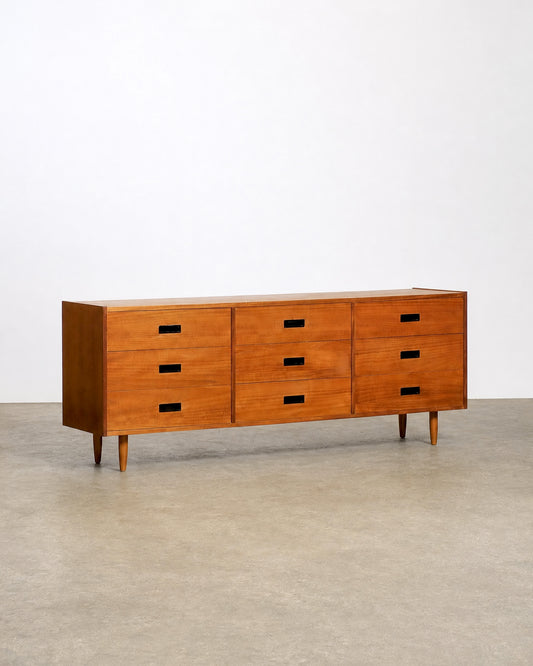 Wide view of the dresser in the showroom among other vintage furniture