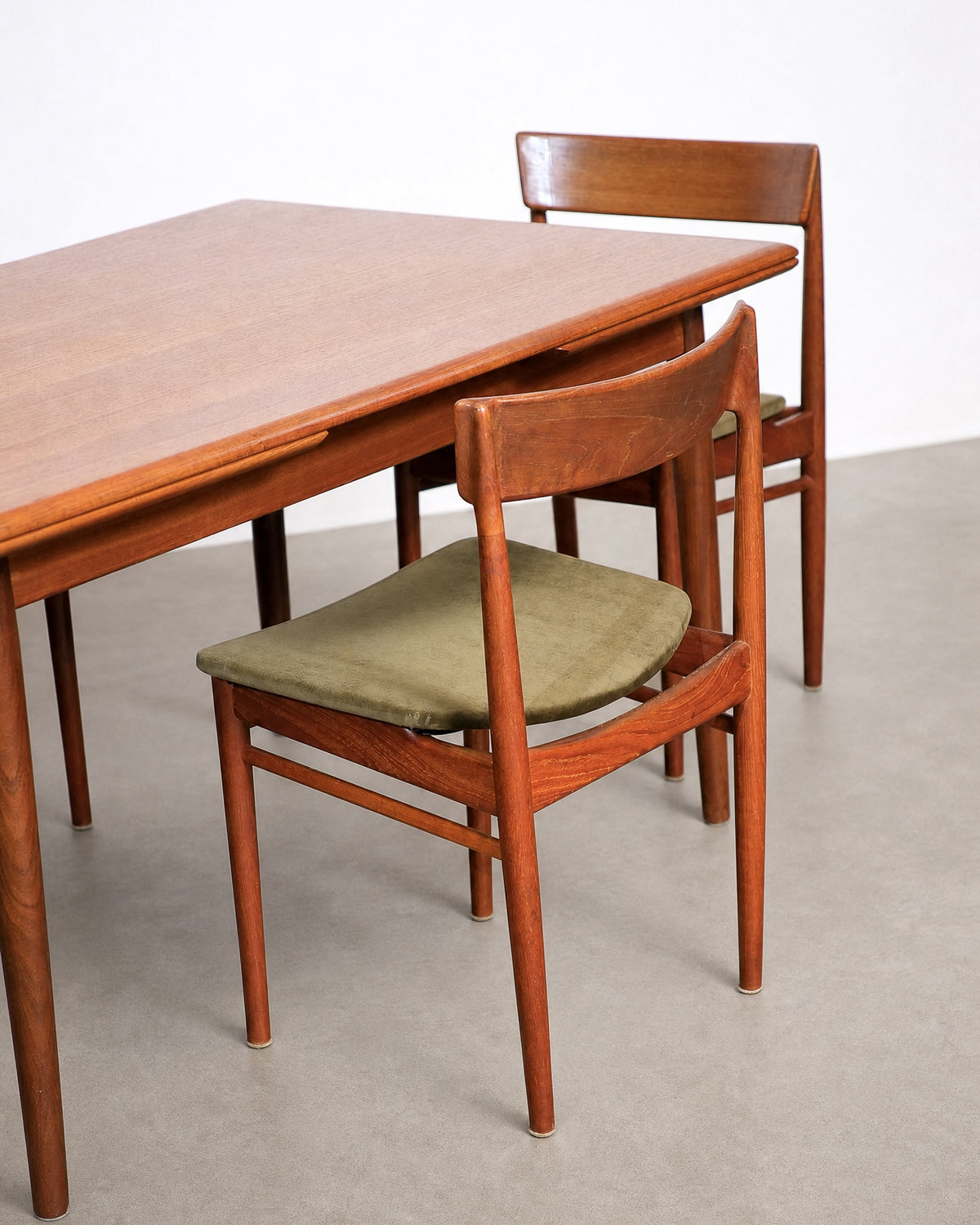 Wide shot of dining set staged in warehouse setting