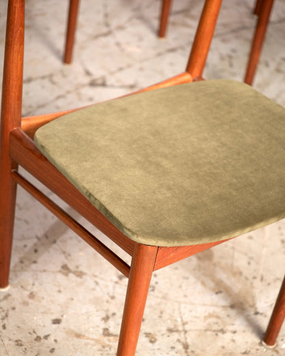 Detail of chair seat and frame joinery with tapered legs visible