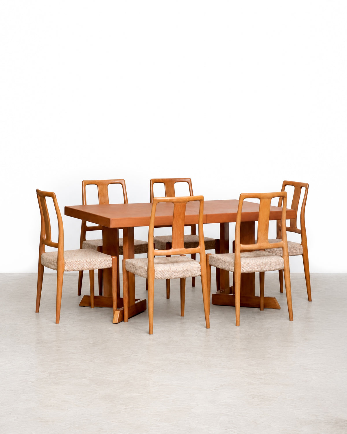 Front view of a dining chair showing the full backrest and seat
