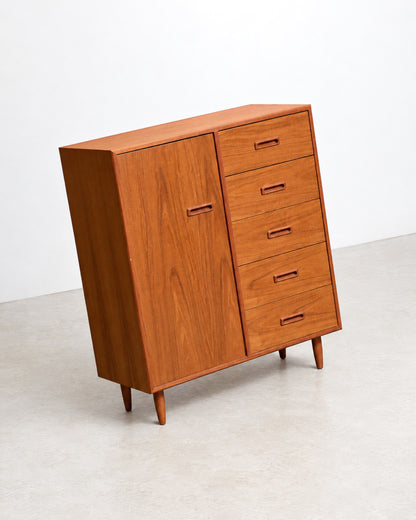 Angled studio view of the gentleman's chest against a white background.
