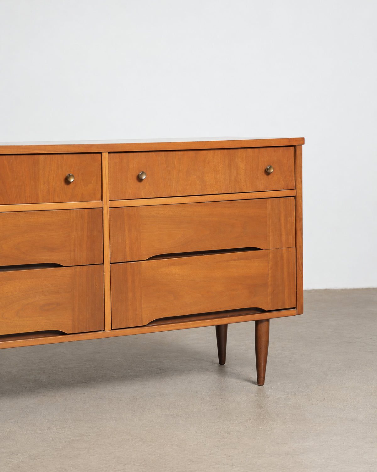 View of the dresser from a slightly elevated angle showing all six drawers.