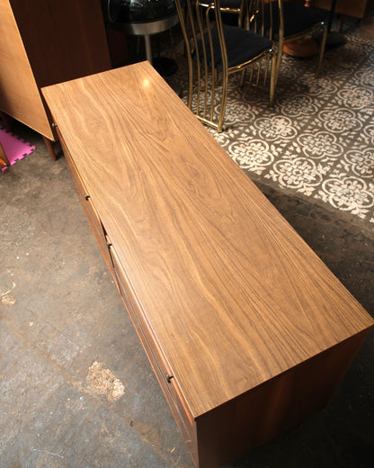 Additional angle showing the dresser's proportions and drawer arrangement.