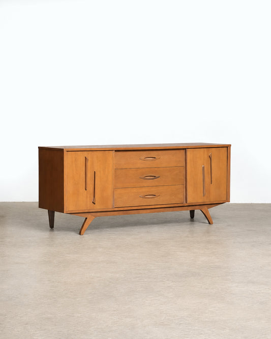 Additional angle of the dresser showing overall proportions and leg design.