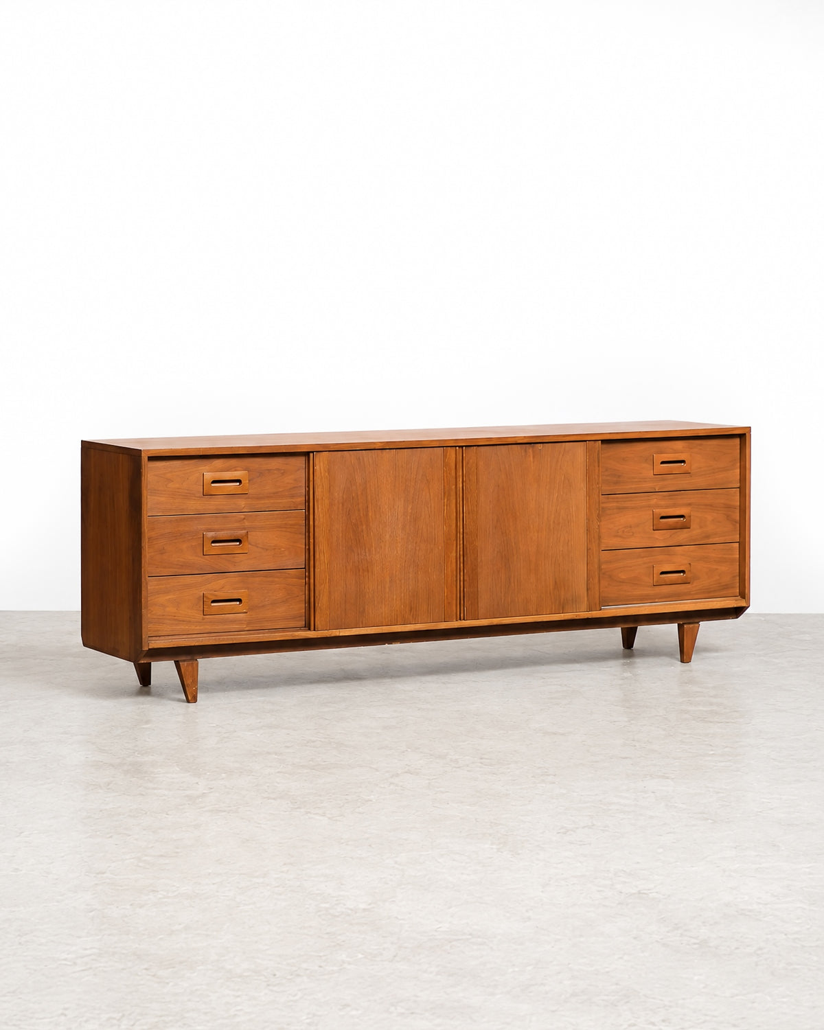 Full front view of the sideboard displaying both drawers and sliding doors together.